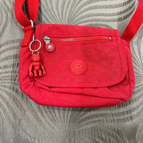 Kipling Bags Kipling New No Tags In Red Also A Belt Purse Poshmark